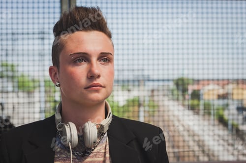 Preview: Pretty Short Hair Girl With Black Jacket Posing On A Bridge