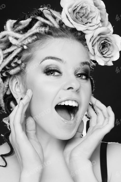Preview: Black And White Shot Of Beautiful Young Sexy Girl With Fancy Hairstyle And Roses Crying