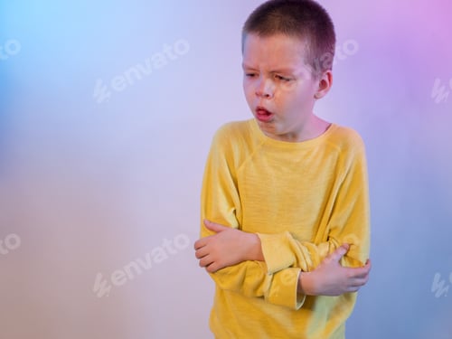 Preview: Cute Blond Boy In Yellow Sweater In Quarantine At Home. Baby Is Struggling With Illness, Fever And