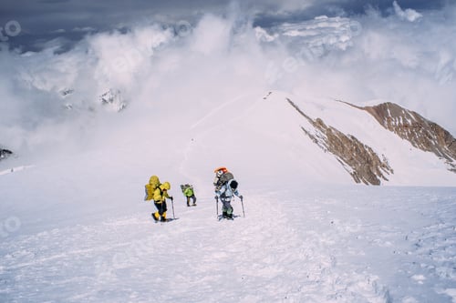 Preview: Group Of People Climbing In High Mountains