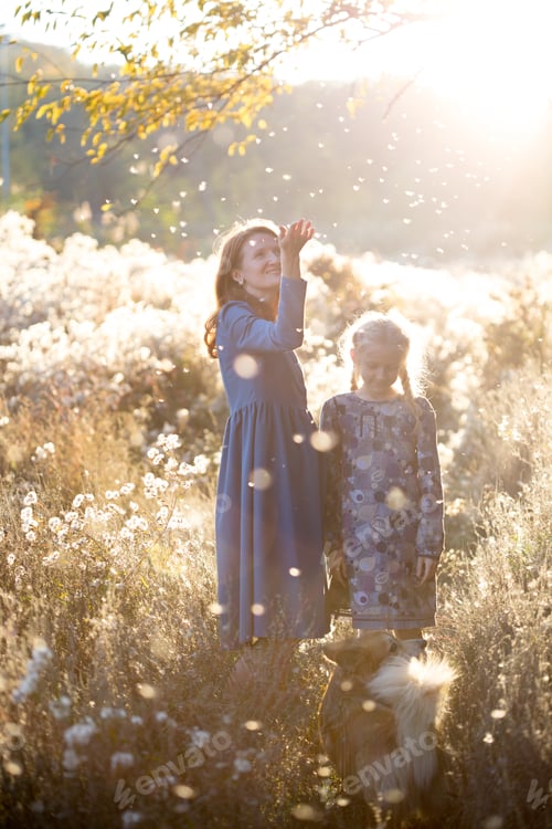 Preview: Happy Family. Smiling Mom And Daughter In The Autumn Park.