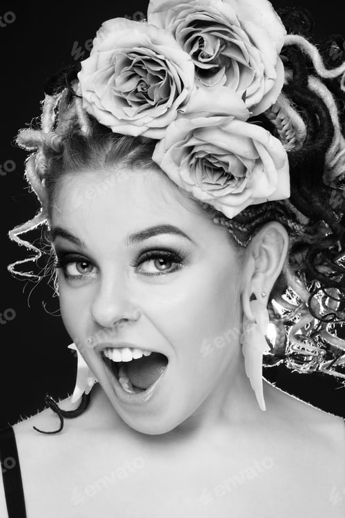 Preview: Black And White Shot Of Beautiful Young Sexy Girl With Fancy Hairstyle And Roses Crying