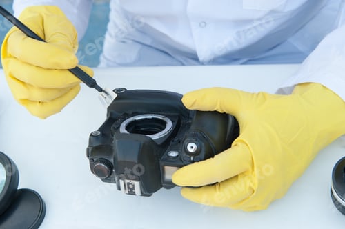 Preview: Elderly Solid Person In White Dressing Gown, Cap, Medical Mask, Glasses Cleans Matrix Of Digital