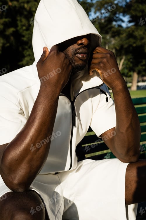 Preview: Portrait Of An Athletic Black Man Posing In A City Park. Concept Of Healthy Lifestyle.