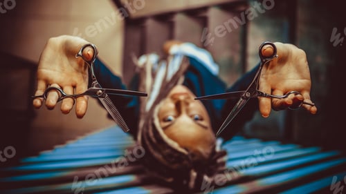 Preview: Woman Hairdresser With Dreadlocks Holding Scissors In Hand Close-Up