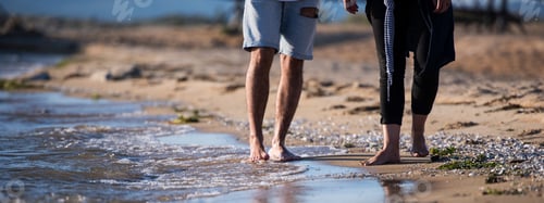 Preview: Couple Walking On The Beach At Sunset.