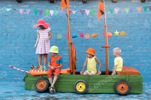 Preview: Three Happy Children Boys And Funny Girl Are Playing On Ship Made From Old Fishing Boat. Brothers