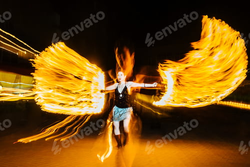 Preview: Girl With Fiery Wings Performs At Night