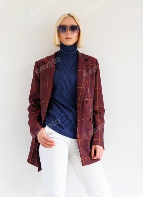 Preview: Stylish Girl Model In Stylish Clothes On A White Background. Fashion Photography.