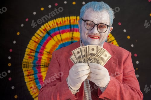 Preview: Elderly Mime Man In Large Glasses With Blue Hair And Beard In Bright Pink Jacket And Tie In White