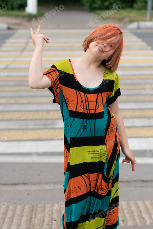 Preview: Little Girl Posing In A City Standing In A Colored Dress
