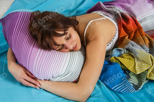 Preview: Beautiful Young Woman Sleeping In The Bed. Relaxing And Peaceful