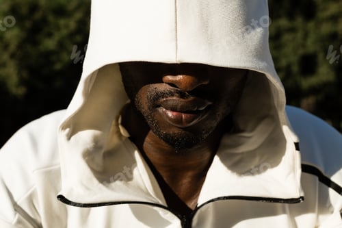 Preview: Portrait Of An Athletic Black Man Posing In A City Park. Concept Of Healthy Lifestyle.