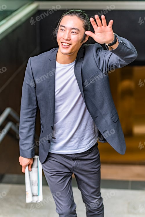 Preview: Handsome Asian Businessman Wearing Suit And Walking Outdoors, Successful Manager During Break