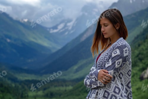 Preview: Stylish Female Hipster Walking On Top Of Mountains. Happy Young Woman Exploring Sunny Mountains