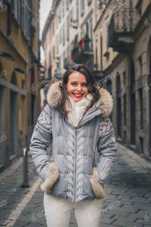 Preview: Beautiful Young Brunette With Long Hair Posing In The City Streets