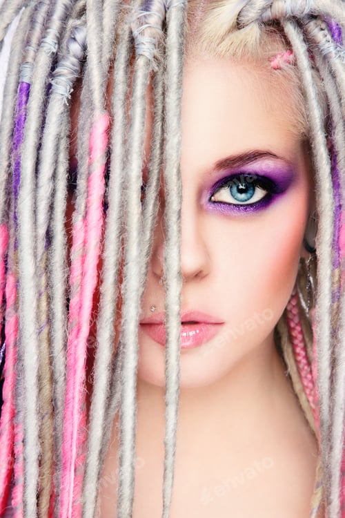 Preview: Portrait Of Young Beautiful Sexy Girl With Stylish Bright Make-Up And Dreadlocks