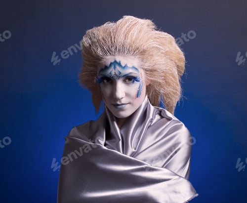 Preview: Portrait Of Winter Woman With A Stylish Visage And Snowy Hair.