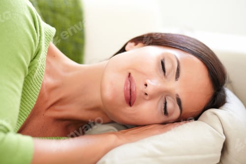 Preview: Attractive Young Woman Resting Horizontally With Eyes Closed - Focus On Foreground