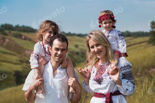 Preview: Ukrainian Family At The Outdoor. Dad, Mom And Two Daughters In Traditional National Clothes