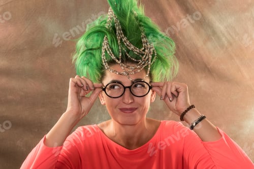 Preview: A Caucasian Girl In A Green Dress And With Green Hair Is Preparing For The Holidays. Suit Of The
