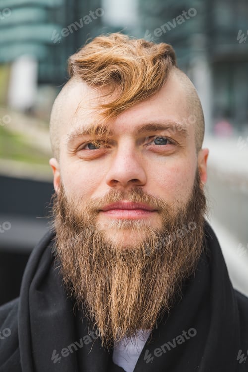 Preview: Stylish Young Bearded Man Posing In An Urban Context