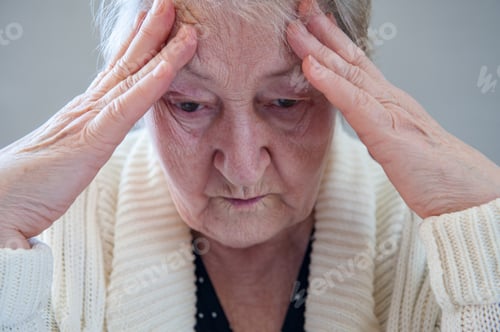Preview: Elderly Woman With Beautiful Wrinkled Face Is Holding Pills In Her Hands To Choose Medicines