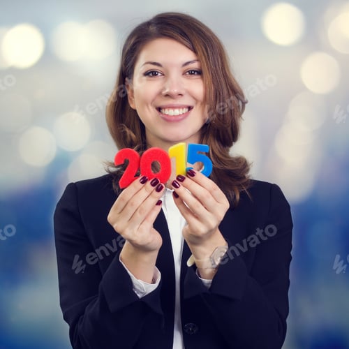 Preview: Happy Business Woman Holding A Figure Of 2015. The Symbol Of The New Fiscal Year.