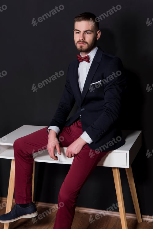 Preview: Elegant Young Handsome Man. Studio Fashion Portrait.