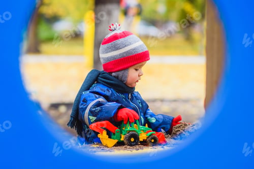 Preview: Beautiful Kid Playing Excavator On The Street