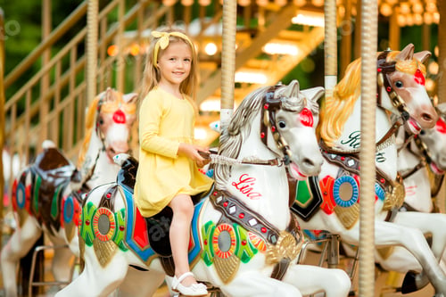 Preview: Adorable Little Girl Near The Carousel Outdoors In Paris, Baby Girl On The Carousel, Happy Healthy