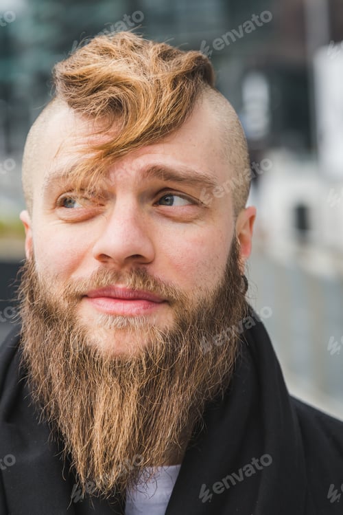 Preview: Stylish Young Bearded Man Posing In An Urban Context