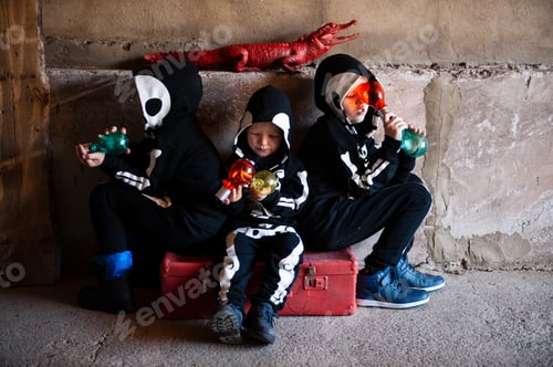 Preview: Happy Children In Carnival Costumes, Boys With A Red Crocodile In The Garage. Black Suit With The