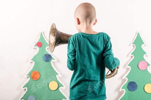 Preview: Happy Child Playing At Home. Funny Guy On Christmas Eve. Christmas Winter Vacation. The Boy Takes