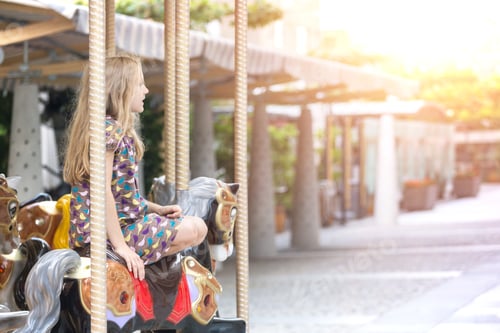 Preview: Little Girl Rides A French Carousel. Paris. France