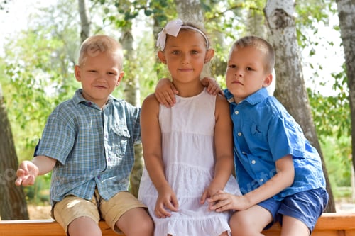 Preview: Caucasian Boys Hug The Young Girl. The Concept Of The Novel At The Resort.