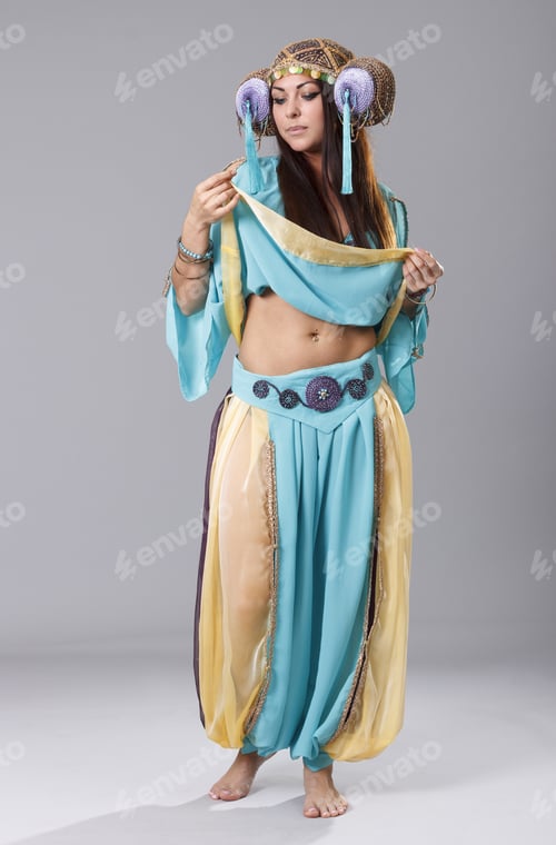 Preview: Beautiful Oriental Woman In Exotic Clothing Dancing Oriental Dance.