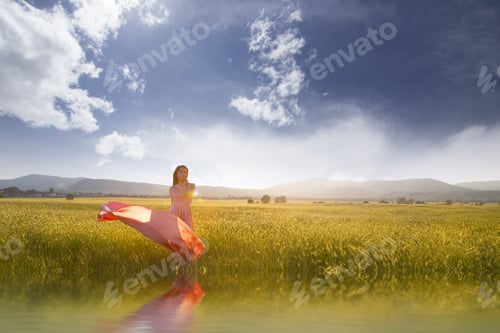 Preview: Beauty Romantic Girl Outdoors. Beautiful Teenage Model Dressed In Long Pink Dress On The Field In