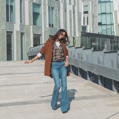 Preview: Beautiful Girl With Long Hair Posing In An Urban Context
