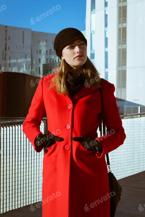 Preview: Beautiful Girl Posing In The Street With Red Coat