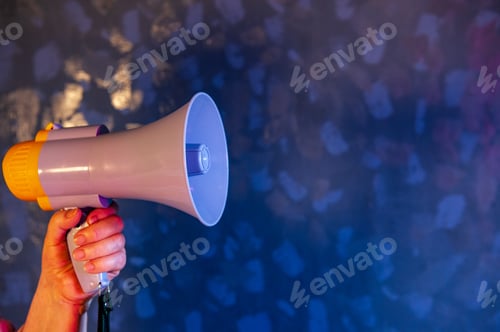 Preview: Beautiful Senior Woman Is Excited, Euphoric, Screaming With Megaphone, Sign Of Revolution And