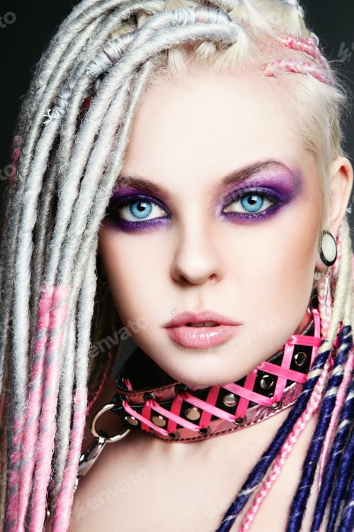 Preview: Portrait Of Young Beautiful Sexy Girl With Stylish Bright Make-Up And Dreadlocks