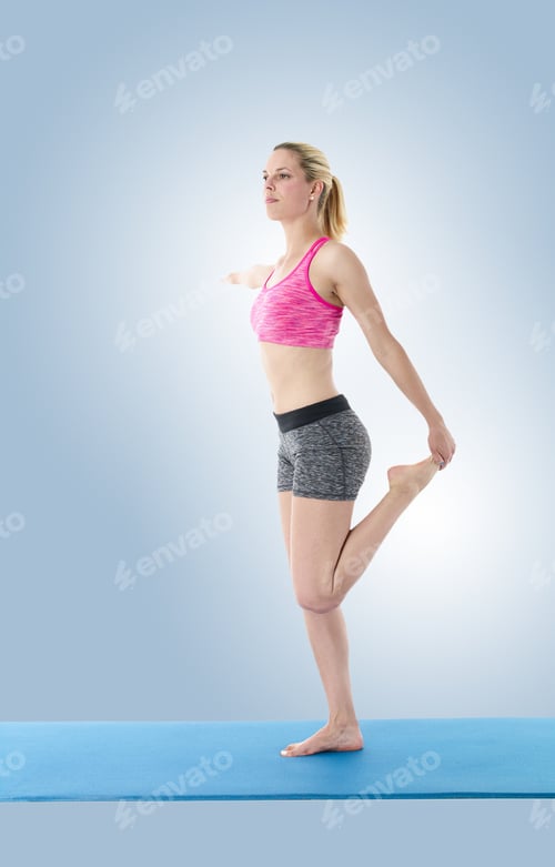 Preview: A Pretty Young Slim Woman Exercising With Yoga