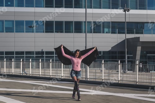 Preview: Beautiful Young Brunette With Over The Knee Boots Posing In The City Streets
