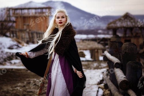 Preview: Beautiful Blonde Viking Dressed In A Black Cloak Against The Backdrop Of The Castle. Beautiful Film