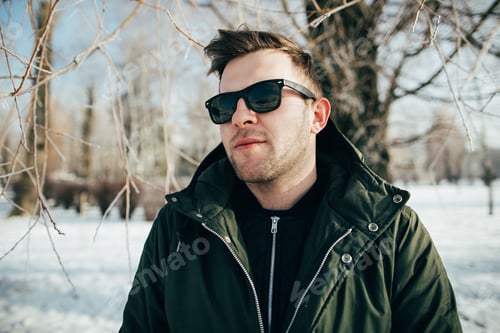Preview: Portrait Of A Handsome Stylish Young Man In Winter.