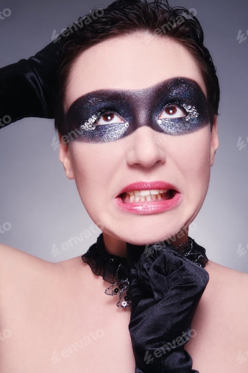 Preview: Woman with Sparkly Mask and Dramatic Expression
