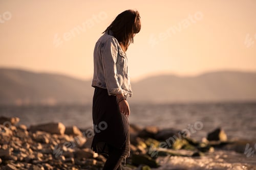 Preview: Happywomen Enjoying Beautiful Sunset Walk On The Beach. Travel Vacation Retirement Lifestyle Concept