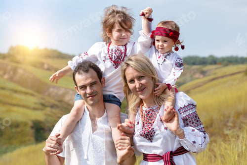 Preview: Ukrainian Family At The Outdoor. Dad, Mom And Two Daughters In Traditional National Clothes