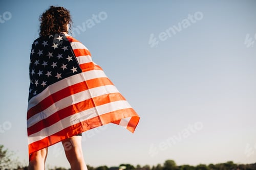 Preview: Adult with American Flag Patriotism in Urban Setting